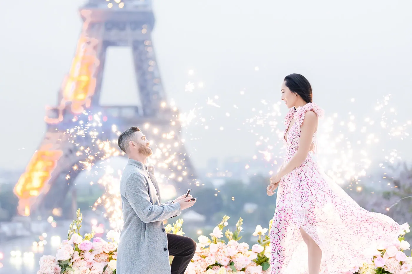 Sunrise Eiffel Tower proposal at Trocadéro with floral arrangements and candlelight for a private Paris proposal