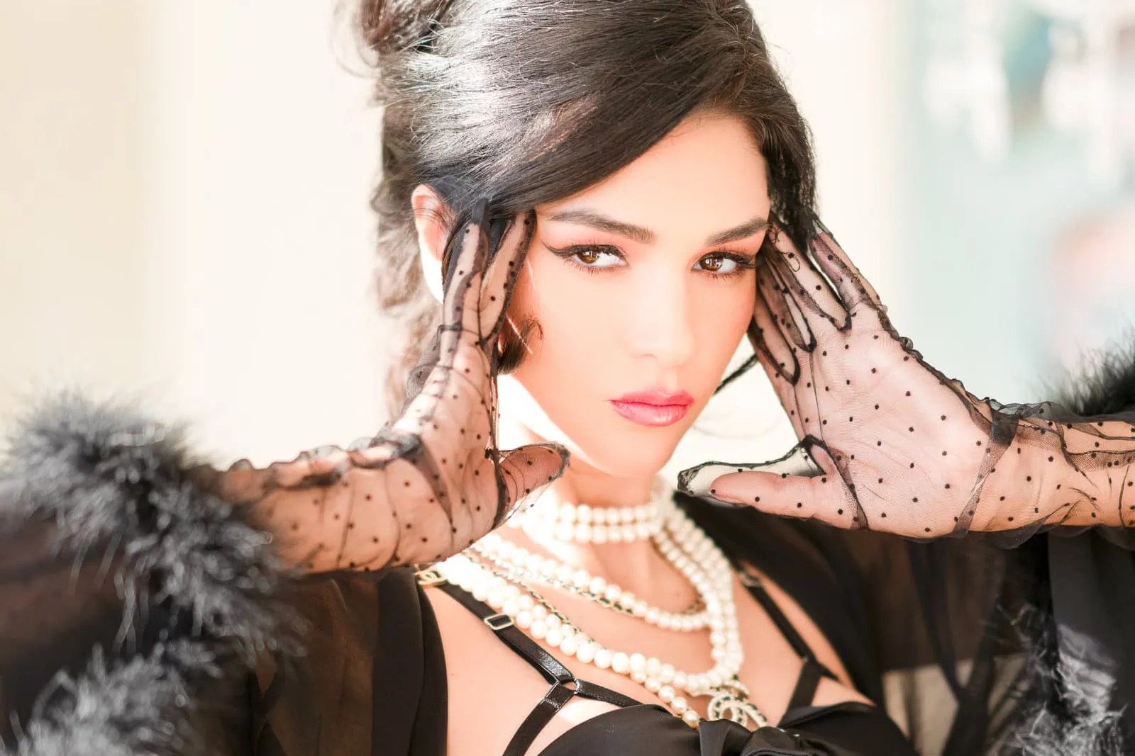 Luxury boudoir portrait with Jean Paul Gaultier and Chanel accessories, professional Paris boudoir photographer session