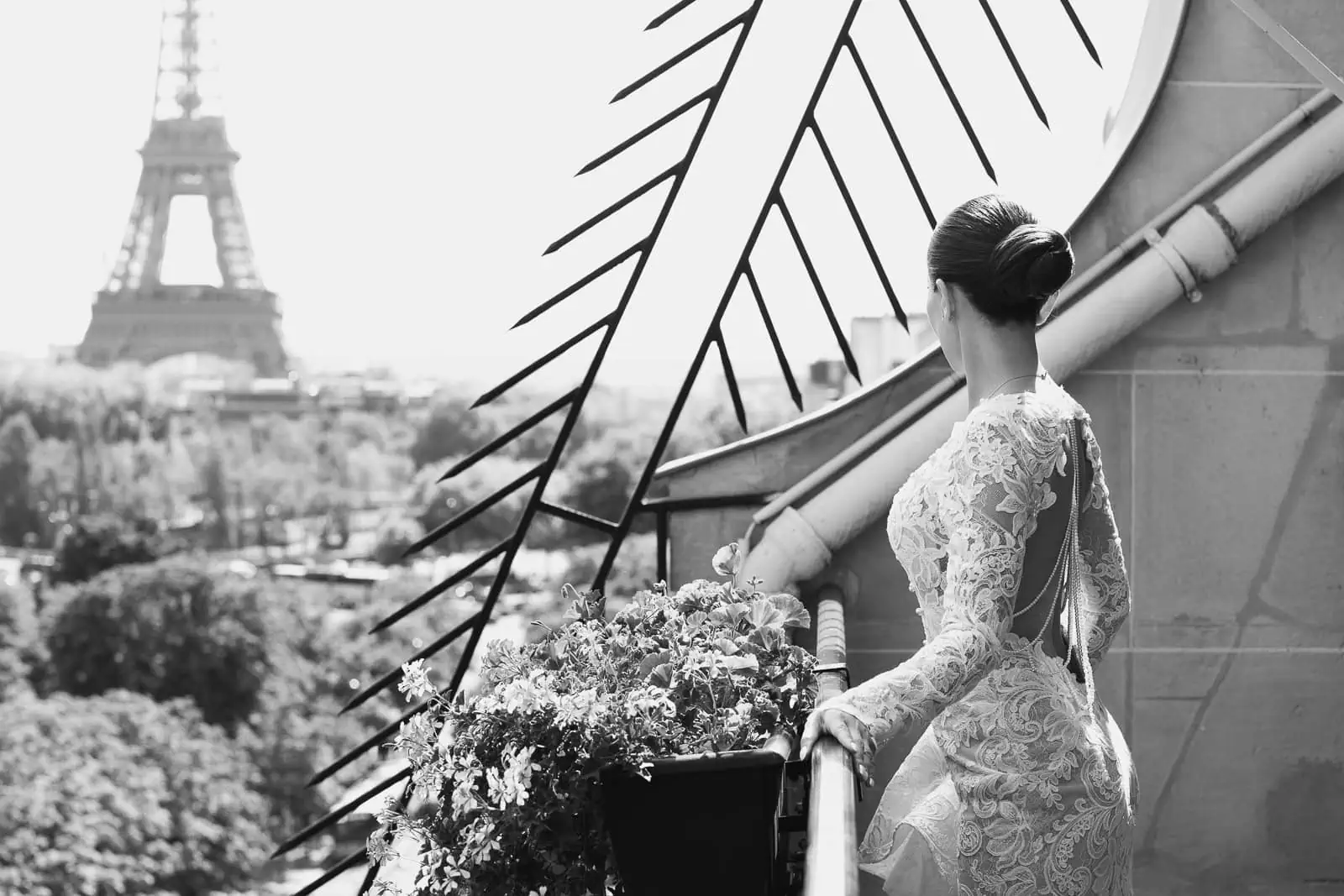 Bride in Berta couture gown on Plaza Athénée Eiffel Tower terrace suite, Paris wedding photographer editorial portrait